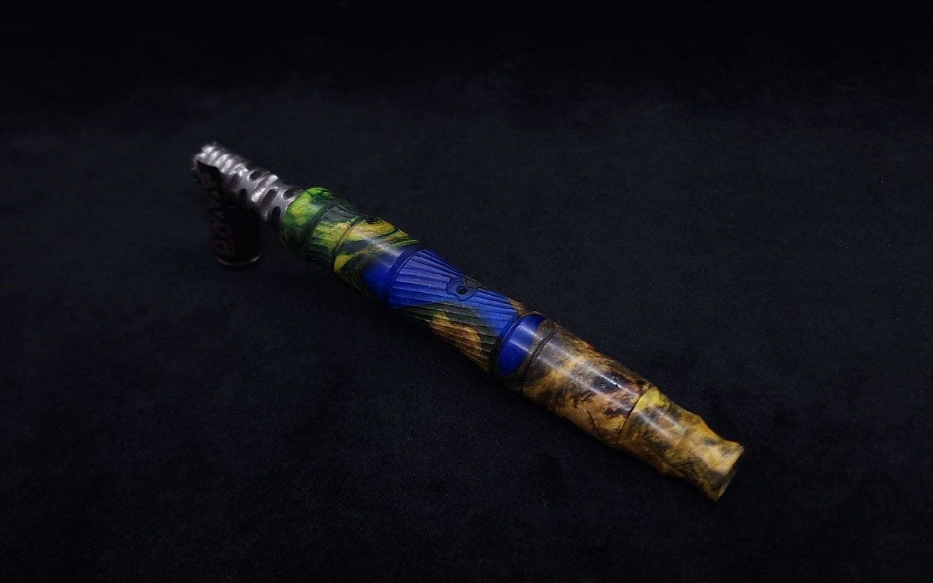 This image portrays Spiraled Hourglass XL Burl Hybrid Luminescent Dynavap Stem + Book-Matched M.P. - NEW! by Dovetail Woodwork.