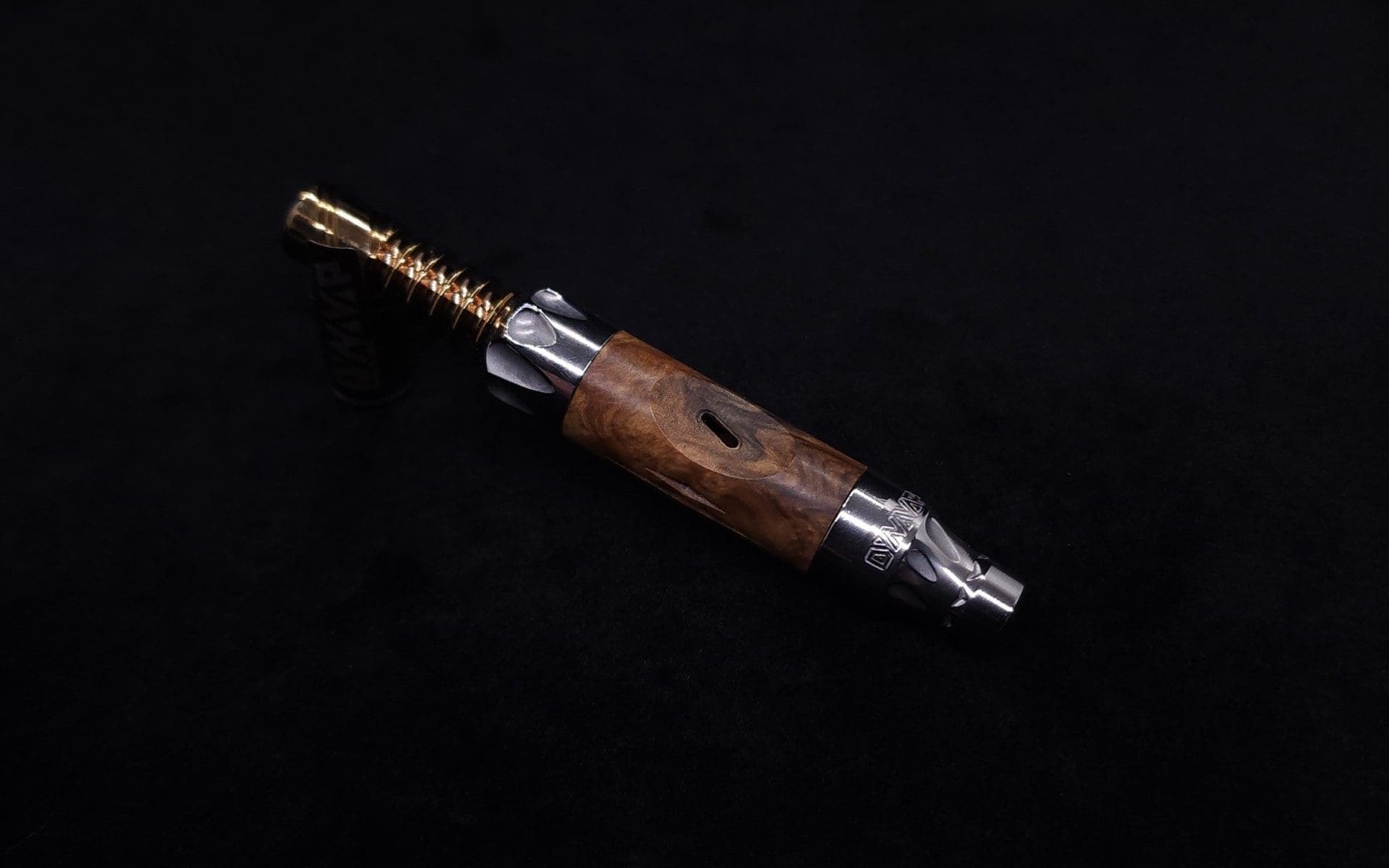This image portrays Vong[i] Burl Wood Sleeve-Graybox Burl Wood by Dovetail Woodwork.