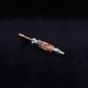 This image portrays Vong[i] Cosmic Burl Sleeve-Highly Figured Maple Burl Hybrid by Dovetail Woodwork.