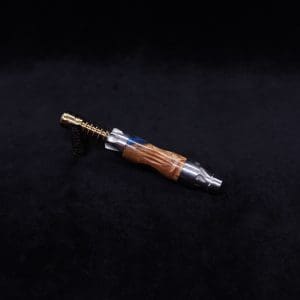 This image portrays Vong[i] Cosmic Burl Sleeve-Highly Figured Maple Burl Hybrid by Dovetail Woodwork.