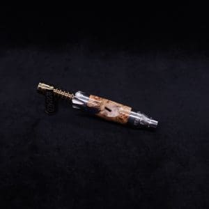 This image portrays Vong[i] Cosmic Burl Sleeve-Highly Figured Maple Burl Hybrid by Dovetail Woodwork.
