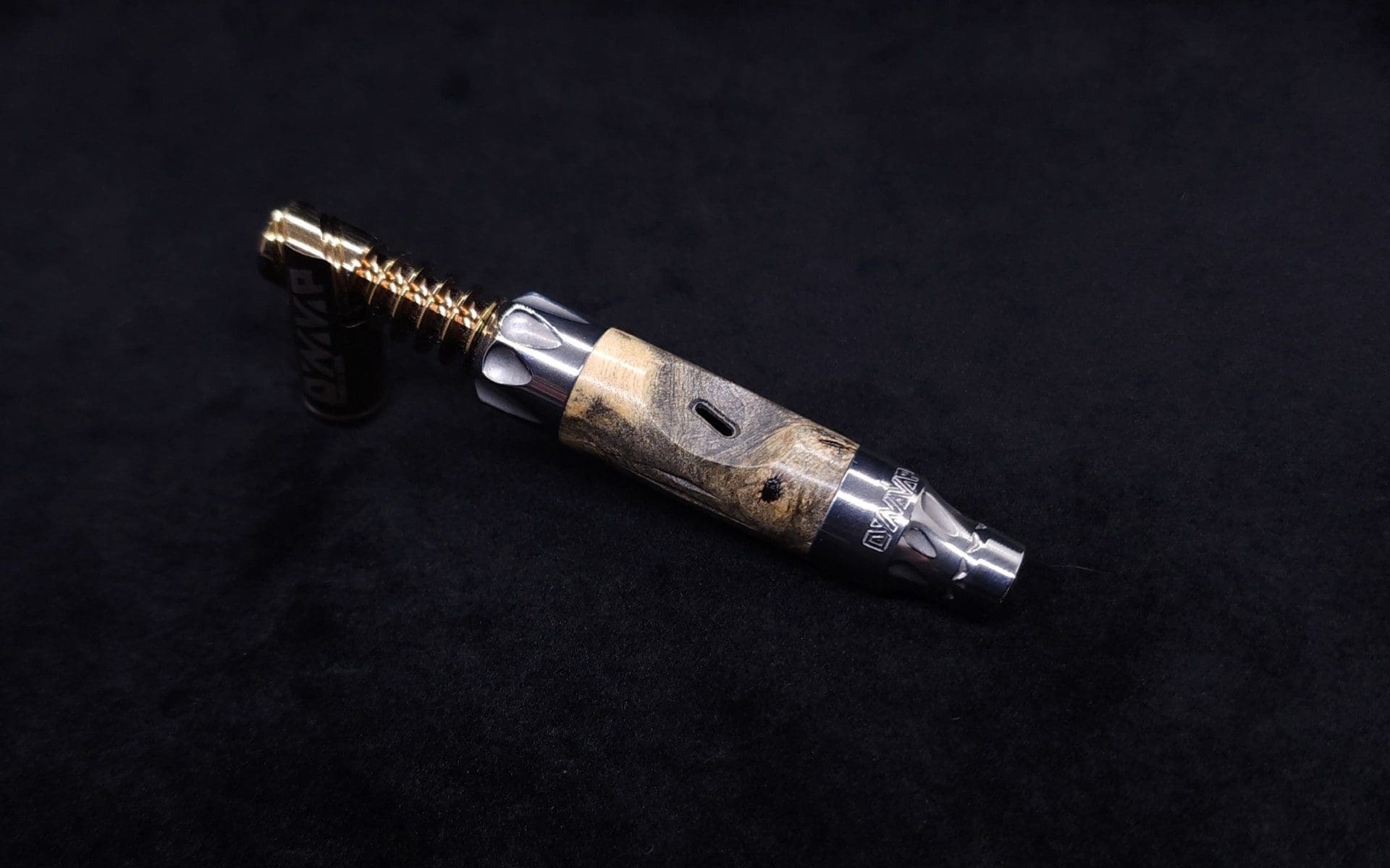 This image portrays Vong[i] Cosmic Burl Sleeve-Buckeye Burl by Dovetail Woodwork.