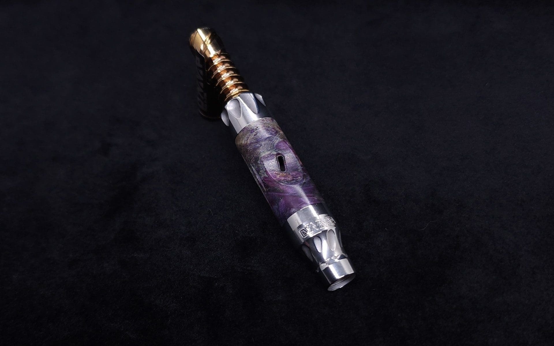 This image portrays Vong[i] Cosmic Burl Sleeve-Vibrant Indigo Buckeye Burl by Dovetail Woodwork.