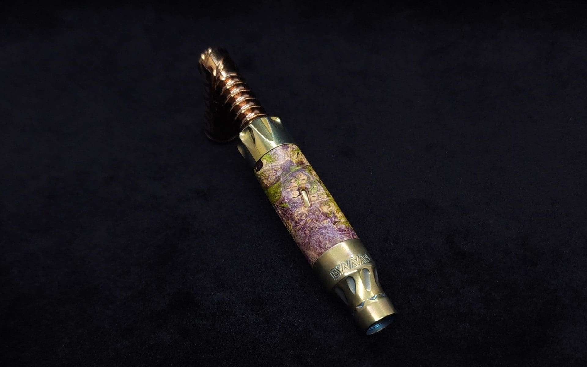This image portrays Vong[i] Cosmic Burl Sleeve-Highly Figured Maple Burl by Dovetail Woodwork.