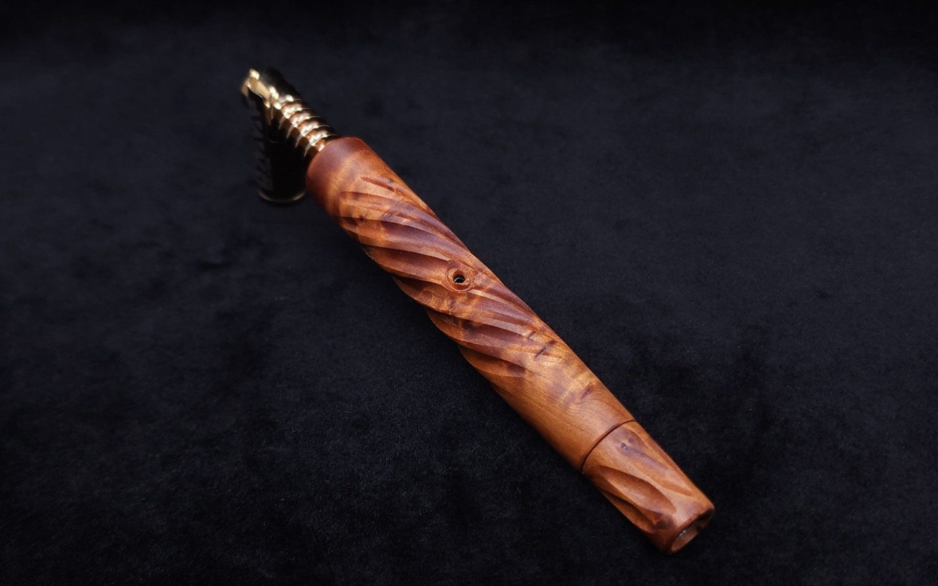 This image portrays The Twisted XL-Dynavap Stem + Book-Matched M.P. - New! by Dovetail Woodwork.