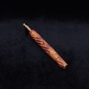 This image portrays The Twisted XL-Dynavap Stem + Book-Matched M.P. - New! by Dovetail Woodwork.