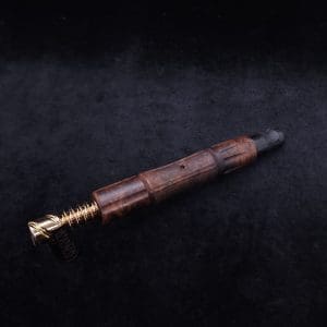 This image portrays The King's Stem XL Burl Wood Dynavap Midsection + Matched Ebony M.P. - NEW DESIGN ☘ by Dovetail Woodwork.