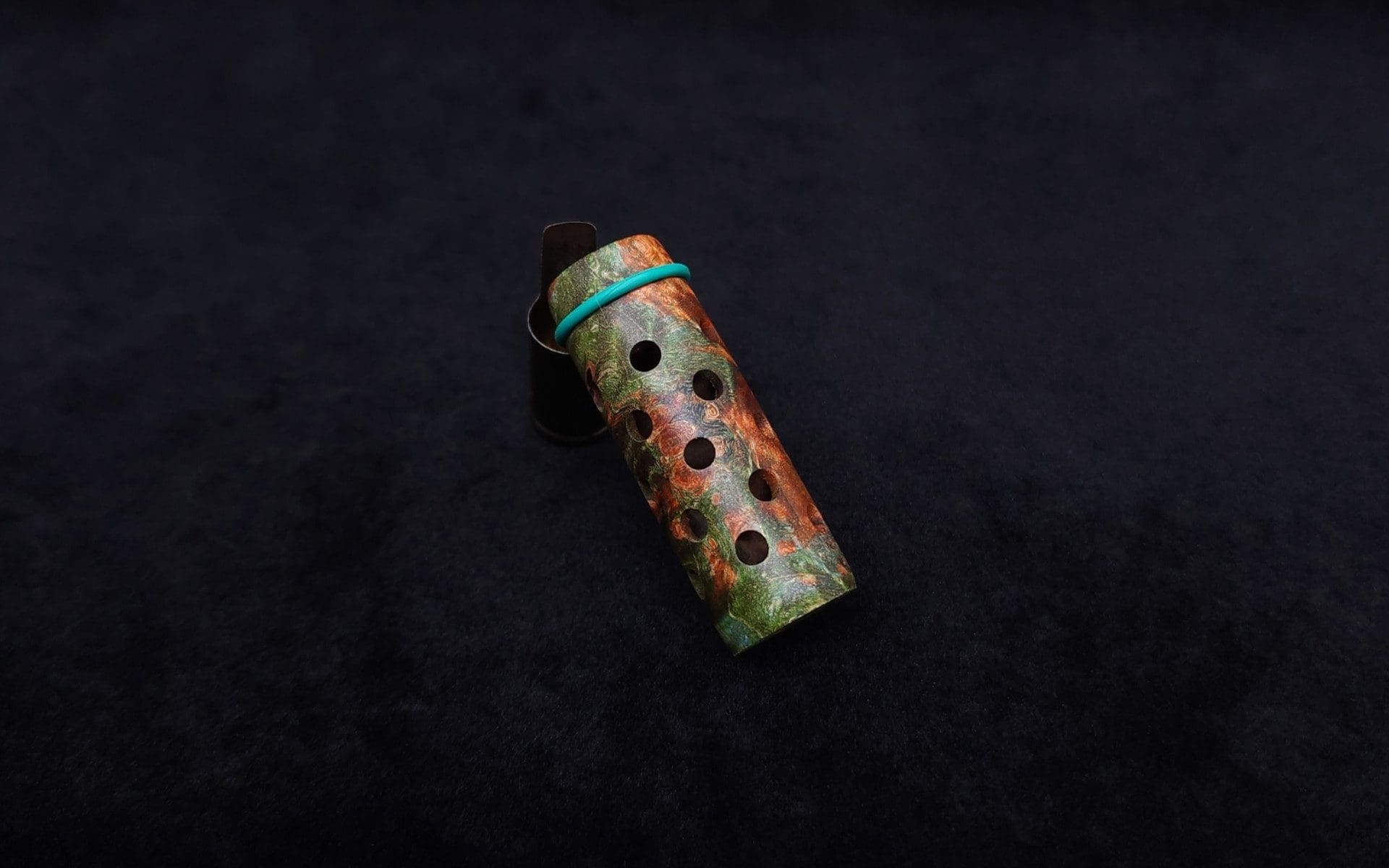 This image portrays Anvil Vestratto Heat Shield Upgrade/Green-Orange Maple Burl by Dovetail Woodwork.