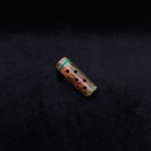 This image portrays Anvil Vestratto Heat Shield Upgrade/Green-Orange Maple Burl by Dovetail Woodwork.