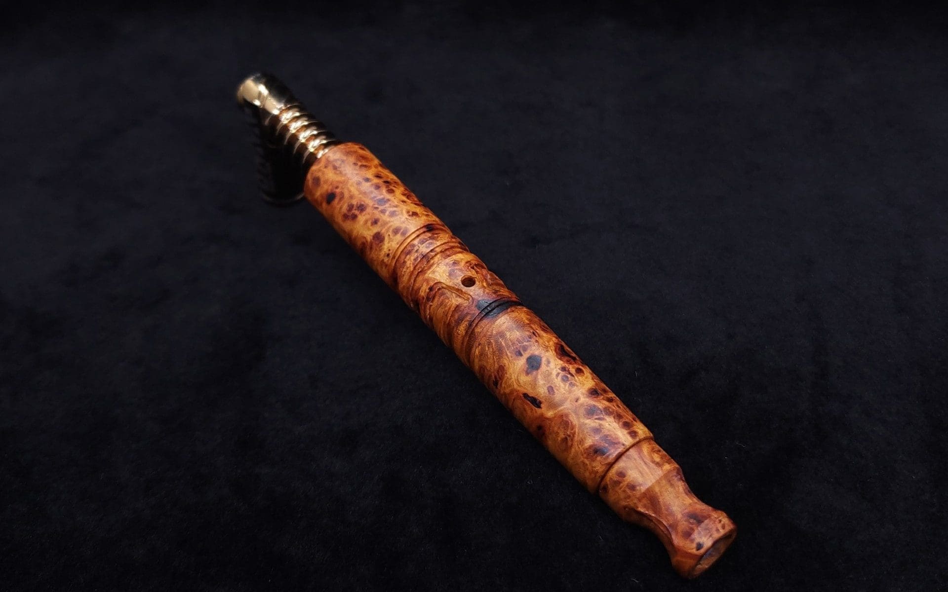 This image portrays Viper XL Stem Dynavap Midsection + Book-Matched M.P. - Exhibition Grade Amboyna Burl ☘ by Dovetail Woodwork.