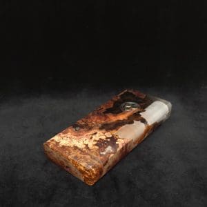 This image portrays Dynavap Dugout Device/Material Storage Case-Manzanita Burl Hybrid XL by Dovetail Woodwork.