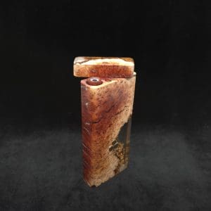 This image portrays Dynavap Dugout Device/Material Storage Case-Manzanita Burl Hybrid XL by Dovetail Woodwork.