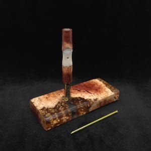 This image portrays Dynavap Dugout Device/Material Storage Case-Manzanita Burl Hybrid XL by Dovetail Woodwork.