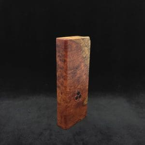 This image portrays Dynavap Dugout Device/Material Storage Case-Live Edge Two-Tone Amboyna Burl XL by Dovetail Woodwork.