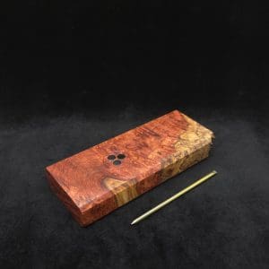This image portrays Dynavap Dugout Device/Material Storage Case-Live Edge Two-Tone Amboyna Burl XL by Dovetail Woodwork.