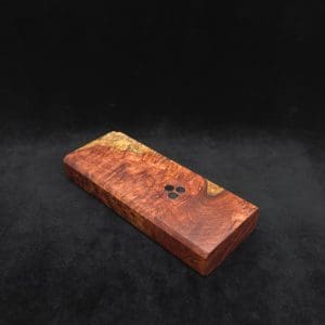 This image portrays Dynavap Dugout Device/Material Storage Case-Live Edge Two-Tone Amboyna Burl XL by Dovetail Woodwork.