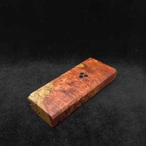 This image portrays Dynavap Dugout Device/Material Storage Case-Live Edge Two-Tone Amboyna Burl XL by Dovetail Woodwork.