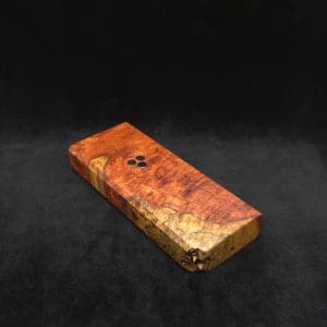 This image portrays Dynavap Dugout Device/Material Storage Case-Live Edge Two-Tone Amboyna Burl XL by Dovetail Woodwork.