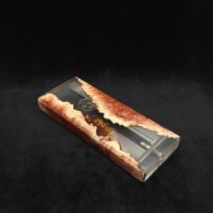This image portrays Dynavap Dugout Device/Material Storage Case-Manzanita Burl Hybrid XXL by Dovetail Woodwork.
