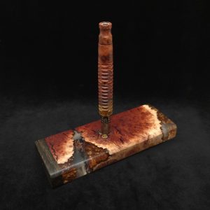 This image portrays Dynavap Dugout Device/Material Storage Case-Manzanita Burl Hybrid XXL by Dovetail Woodwork.