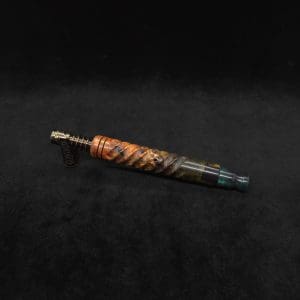 This image portrays Specialty Spiral Design XL Hybrid Dynavap Stem + Book-Matched M.P. - New! by Dovetail Woodwork.