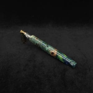 This image portrays Dynavap XL Burl Hybrid Cosmic Stem-Eclipse Design + Book-Matched M.P. by Dovetail Woodwork.