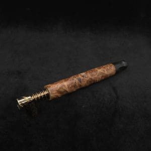 This image portrays Tri-Channel XL Dynavap Stem Highly Figured Maple Burl + Ebony M.P. ☘ by Dovetail Woodwork.