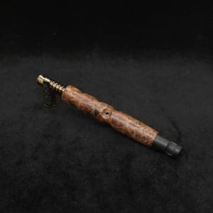 This image portrays Tri-Channel XL Dynavap Stem Highly Figured Maple Burl + Ebony M.P. ☘ by Dovetail Woodwork.