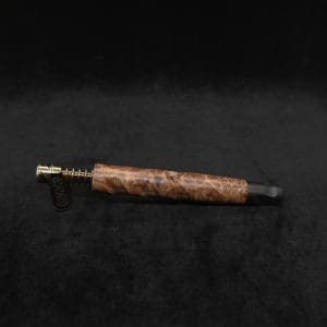 This image portrays Tri-Channel XL Dynavap Stem Highly Figured Maple Burl + Ebony M.P. ☘ by Dovetail Woodwork.