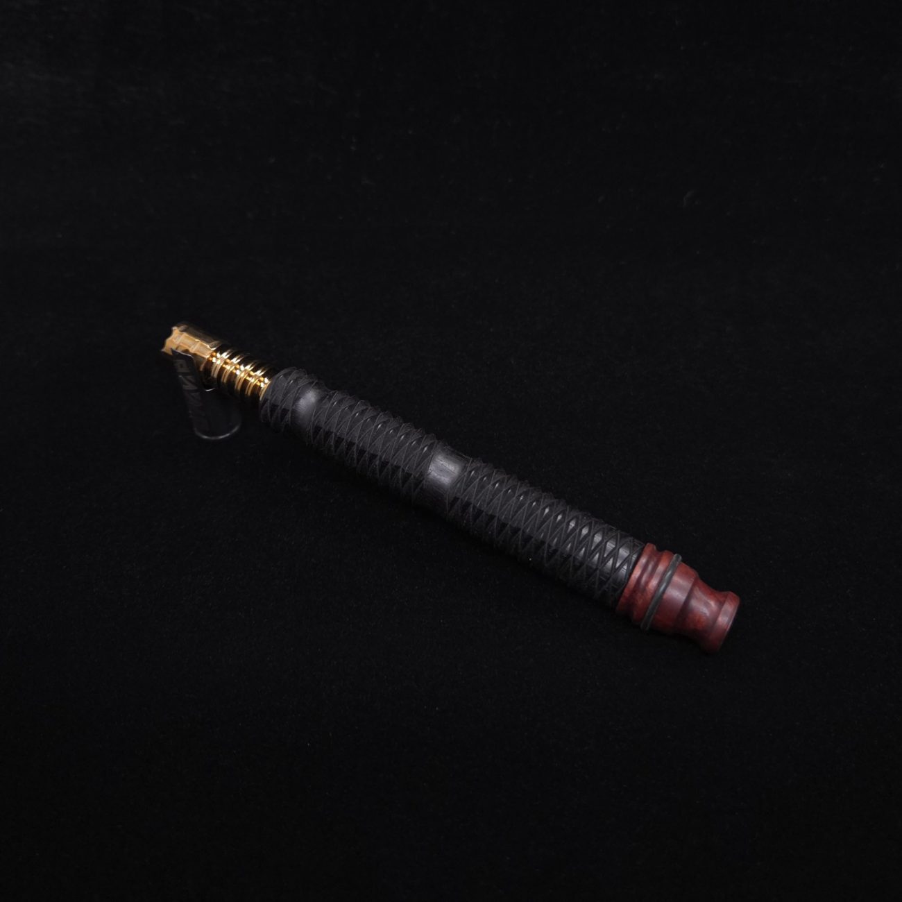 This image portrays Armored Weave XL Ebony Dynavap Stem + Matched Mouthpiece - New!🔥 by Dovetail Woodwork.