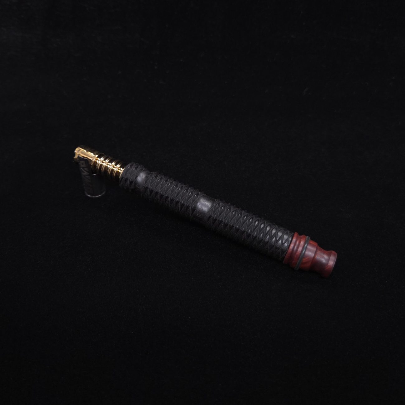 This image portrays Armored Weave XL Ebony Dynavap Stem + Matched Mouthpiece - New!🔥 by Dovetail Woodwork.