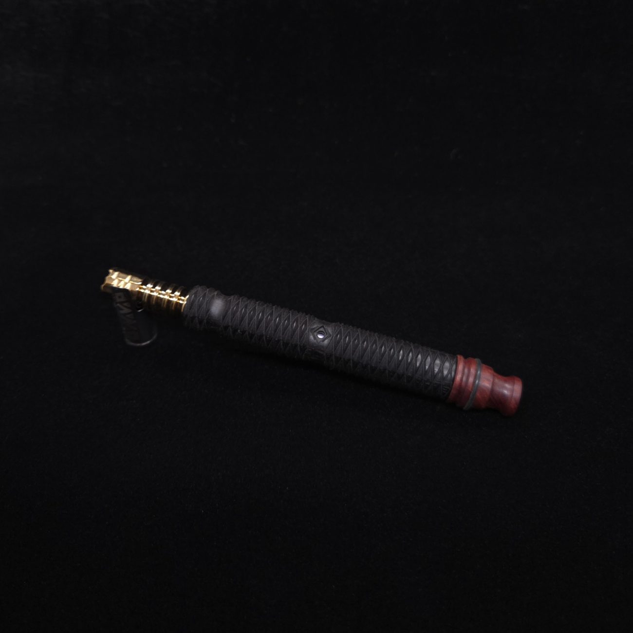 This image portrays Armored Weave XL Ebony Dynavap Stem + Matched Mouthpiece - New!🔥 by Dovetail Woodwork.