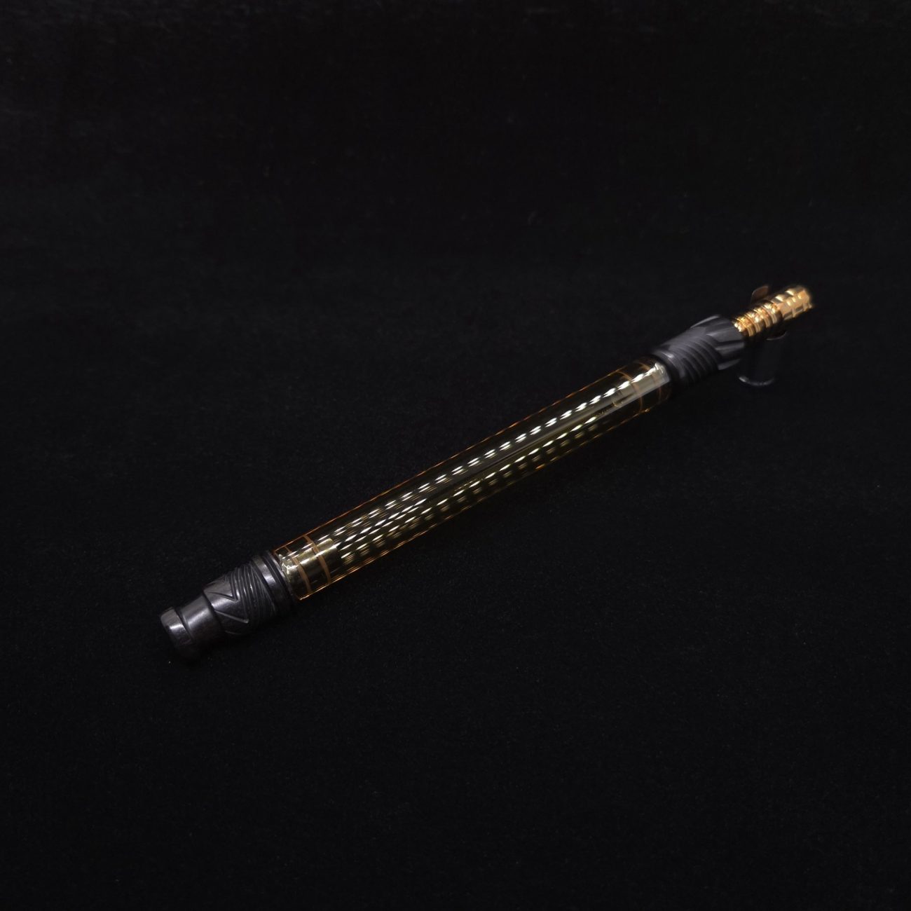This image portrays Dynavap Vertex Golden Boro-Glass Jr./Ebony Wood Specialty Stem Setup-NEW! by Dovetail Woodwork.