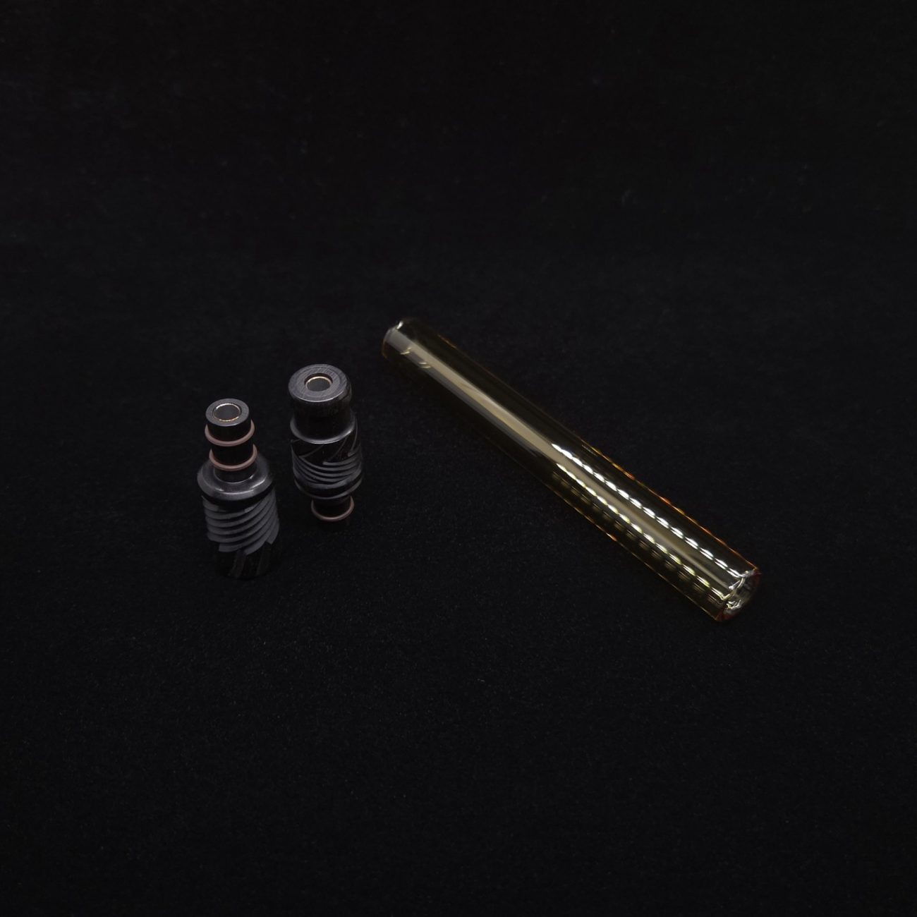 This image portrays Dynavap Vertex Golden Boro-Glass Jr./Ebony Wood Specialty Stem Setup-NEW! by Dovetail Woodwork.