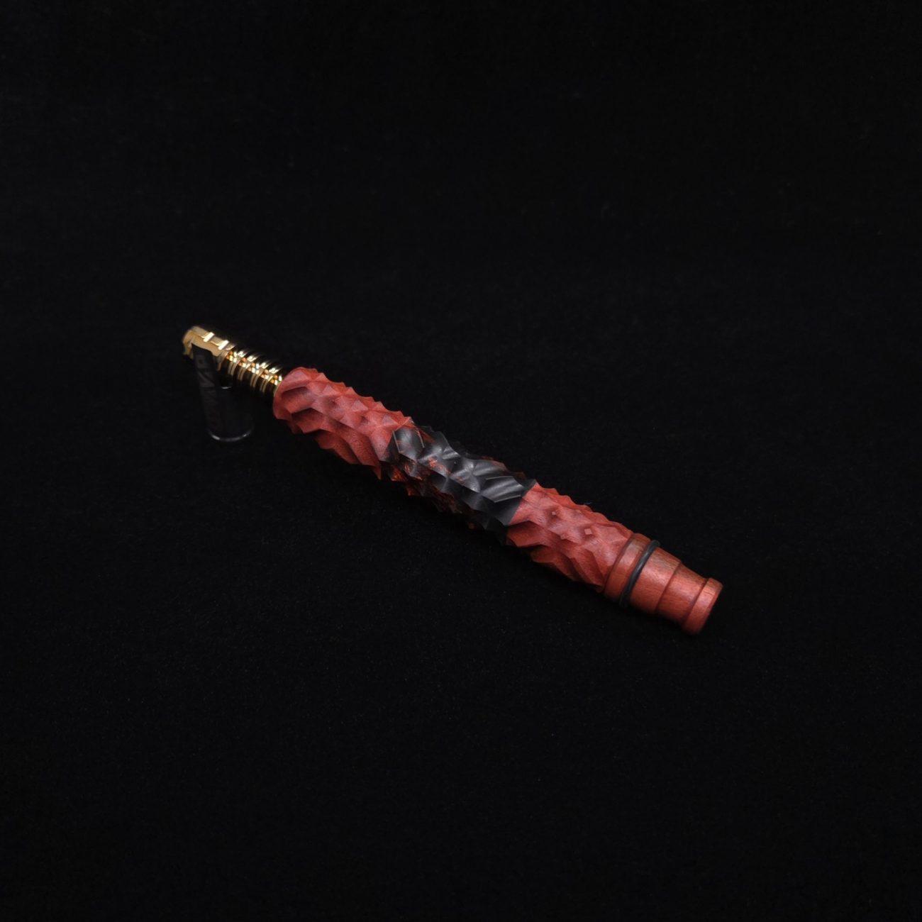 This image portrays High Class Reaper Redheart XL Hybrid Dynavap Stem + Book-Matched WPA Spinning Mouthpiece 𓌜 by Dovetail Woodwork.