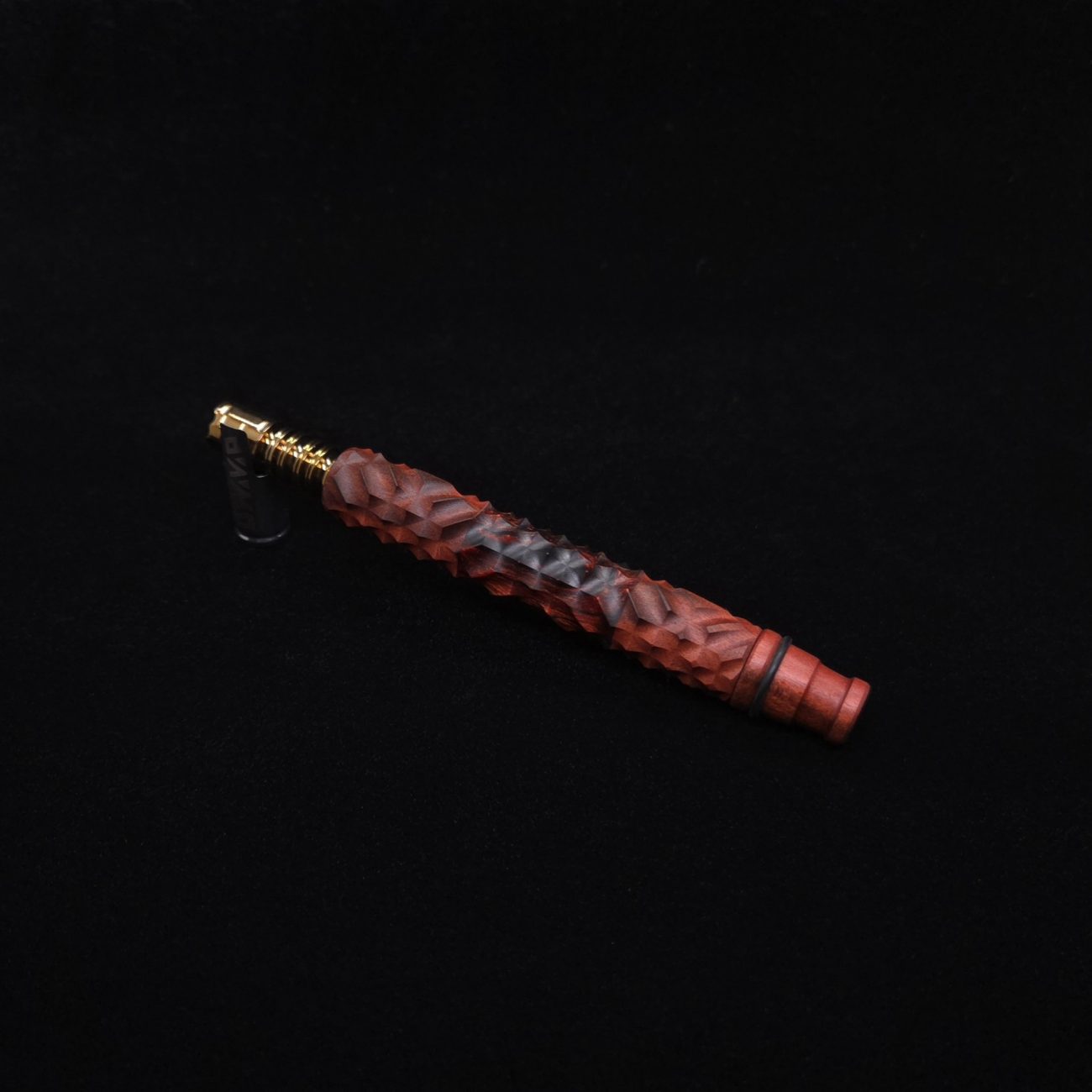 This image portrays High Class Reaper Redheart XL Hybrid Dynavap Stem + Book-Matched WPA Spinning Mouthpiece 𓌜 by Dovetail Woodwork.